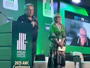 Nigel Tattersall, Helen McIntee and Ralf Strauss (on screen) unveil the new World Marketing Council