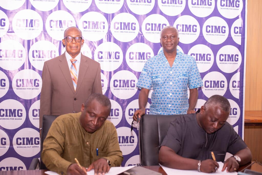 Representatives of CIMG (right) and Kings University College sign the MoU