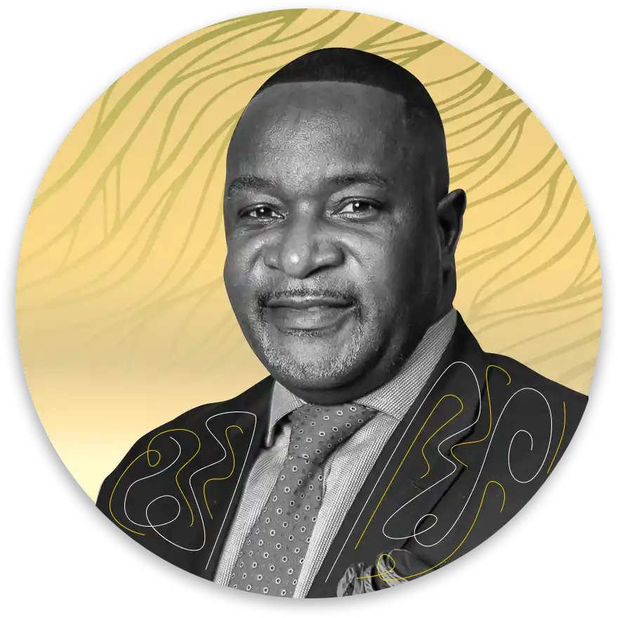 Portrait of a smiling man in a suit and tie inside a gold circular badge with a black background and decorative script overlay suggesting a business leader profile