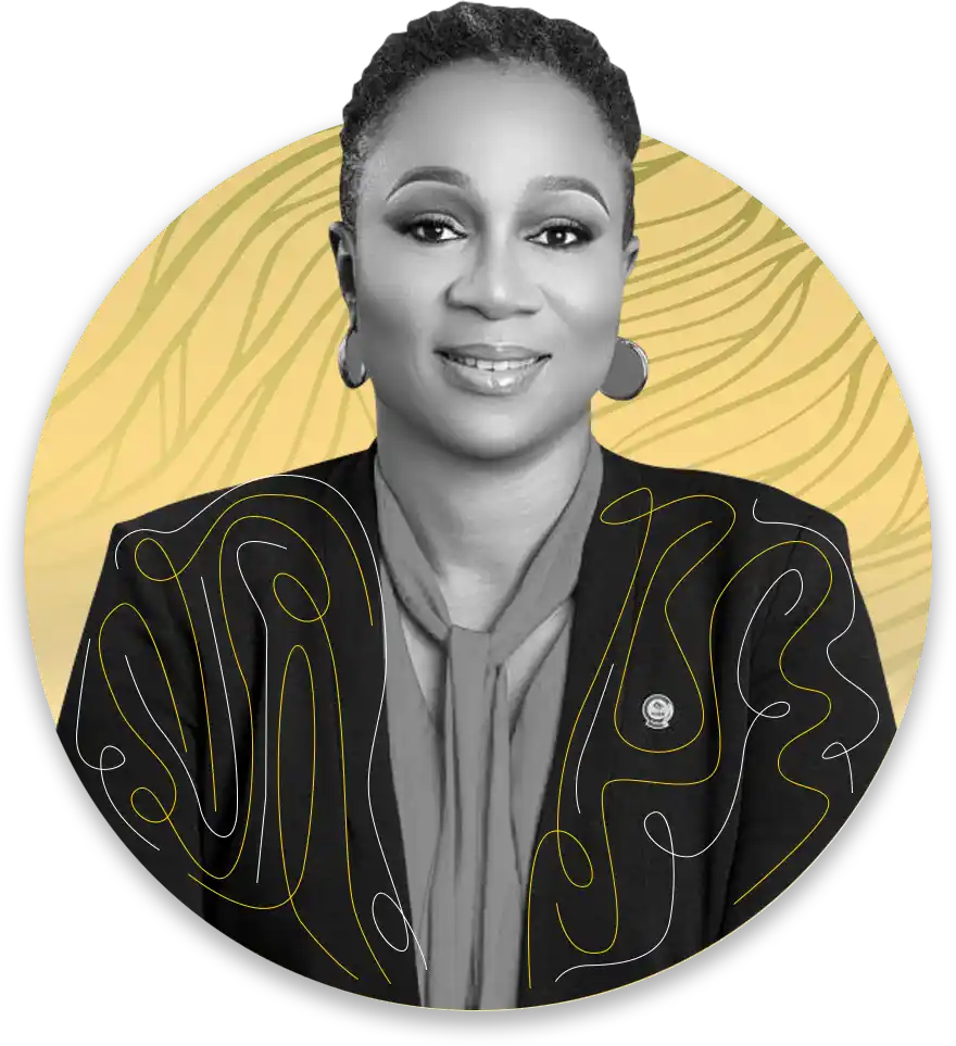 Professional portrait of a smiling black woman in a blazer with a circular yellow abstract backdrop