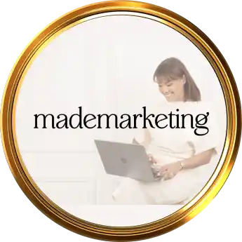 Circular gold badge featuring a woman using a laptop with the text &aposmademarketing&apos across the center